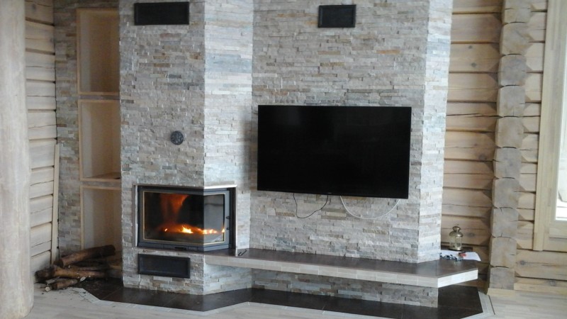 Отделка и облицовка камина под камень